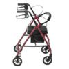 A R726 rollator walker in red features four wheels, a black seat, padded backrest, and hand brakes. It includes a storage bag under the seat. The walker is shown on a white background from the side view.