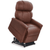 The Golden Technologies®️ Comforter with ZG+ PR 545 is a brown leather recliner chair featuring thick cushioning, a motorized lift, high backrest, wide armrests, and can be set to a partially upright position.