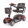 The Golden 4-wheel Buzzaround EX is a sleek black and red mobility scooter featuring a front basket, padded seat with armrests, handlebars for steering, and four wheels.