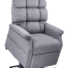 The Golden Technologies®️ Cambridge PR 401 is a plush gray recliner with an extended footrest, padded armrests, textured fabric, and cushioned back for comfort. It rests on a metal base designed to assist in standing.