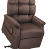 The Golden Technologies®️ Cambridge PR 401 is a brown recliner chair with a plush, tufted backrest and thick armrests, featuring a side pocket for remote controls and positioned on a black metal base.
