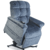 The Golden Technologies®️ Cloud PR 510 is a plush blue recliner with soft cushioning, featuring a lift mechanism that raises the seat at an angle. A remote control on the armrest highlights its power-adjustable design.