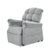 The Golden Technologies®️ Cloud PR 510 is a plush, light gray recliner chair featuring a tufted backrest and cushioned armrests on a white background, offering comfort and an inviting design perfect for relaxation.