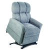 The Golden Technologies®️ Comforter with MaxiComfort PR 535 is a blue-grey lift chair featuring plush upholstery, a slight recline, raised leg support, and a black base, ideal for assisting with sitting and standing.