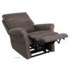 The Pride VivaLift!® Urbana 2 Collection Model PLR-965 is a plush, dark brown reclining chair featuring padded armrests and an extended footrest. Slightly angled for comfort, it highlights its sturdy frame and comfortable seating, perfect for relaxation.